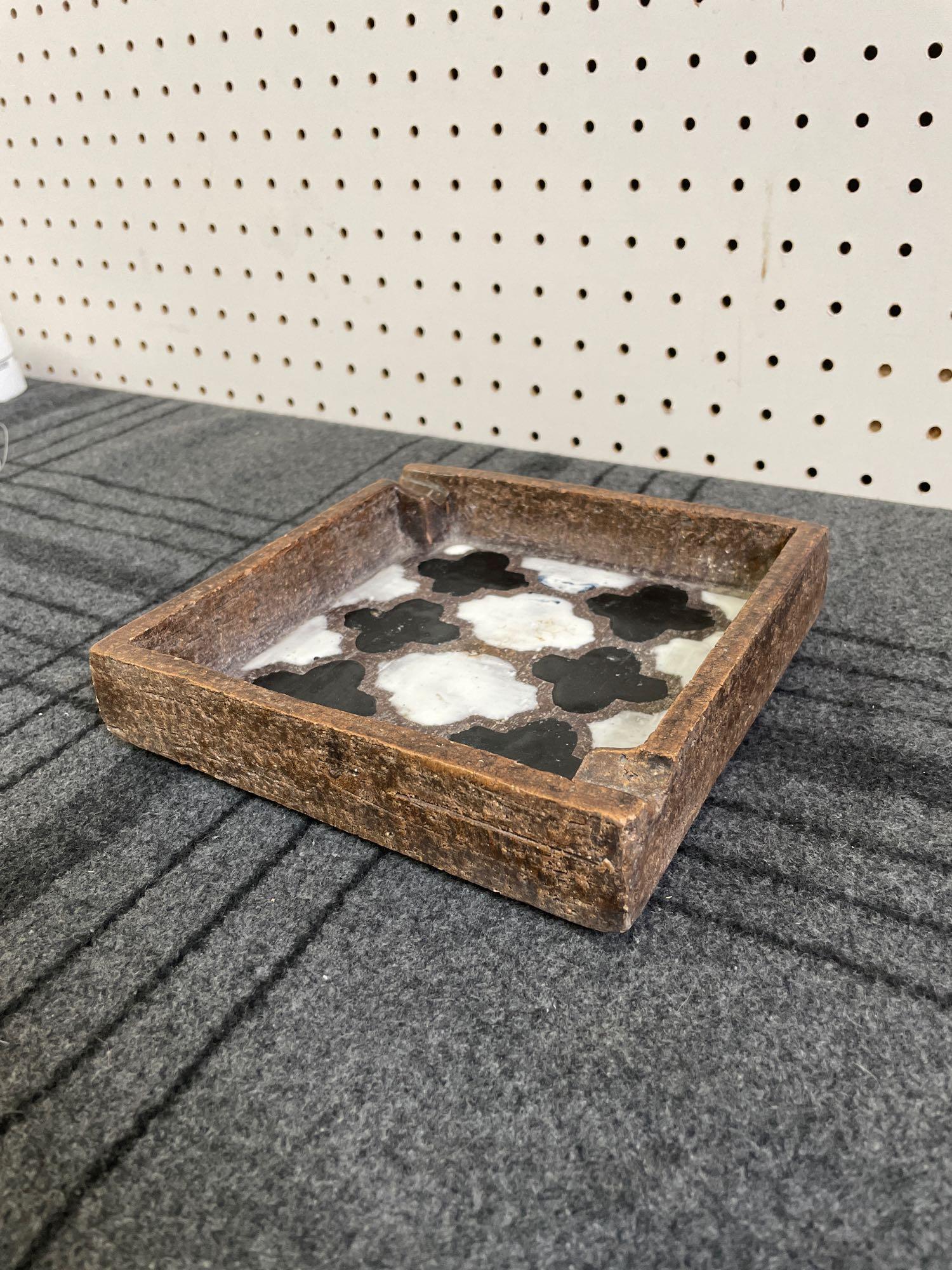 Bitossi Ash Tray: (S) Brown ceramic Bitossi ash tray with black and white patterned interior. 7" W x 7" L. Shipping available call (717) 576-0778 for a quote.