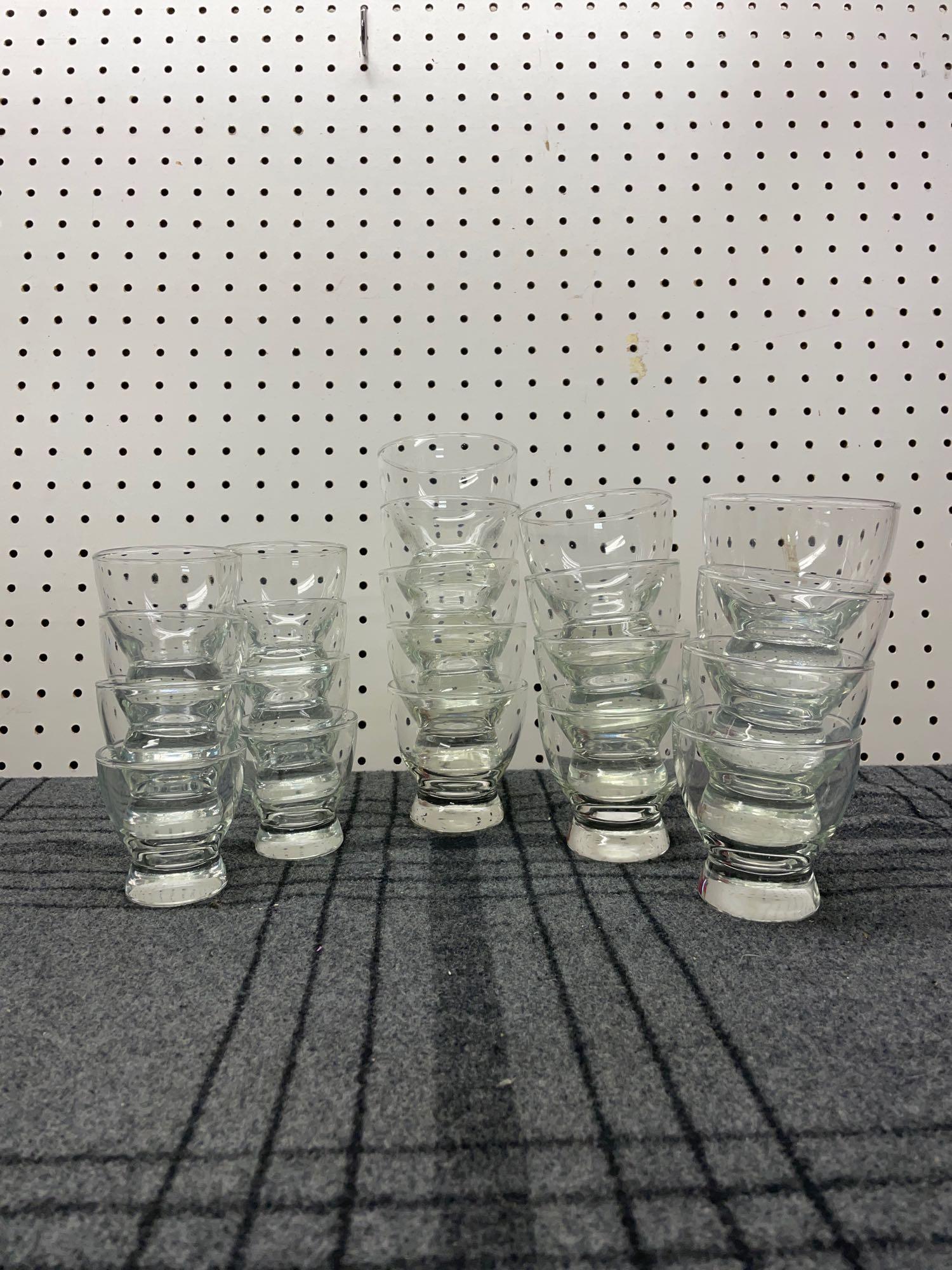 Eva Zeisel Prestige Cocktail Glasses: (W) (13) Large and (8) small Eva Zeisel "Prestige" cups. Large cups: 3-1/2" Diameter x 3-1/2" Tall. Small cups: 2-3/4" Diameter x 3" Tall. Shipping available call (717) 576-0778 for a quote.