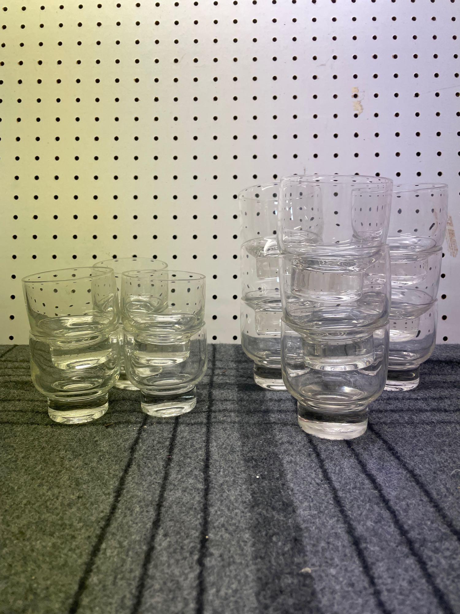 Set of Eva Zeisel "Stockholm" Glasses: (W) 6-person set of large and small vintage drink glasses by Eva Zeisel. Large: 3" Diameter x 3 1/2" Tall. Small: 2-1/2" Diameter x 3" Tall. Shipping available call (717) 576-0778 for a quote.