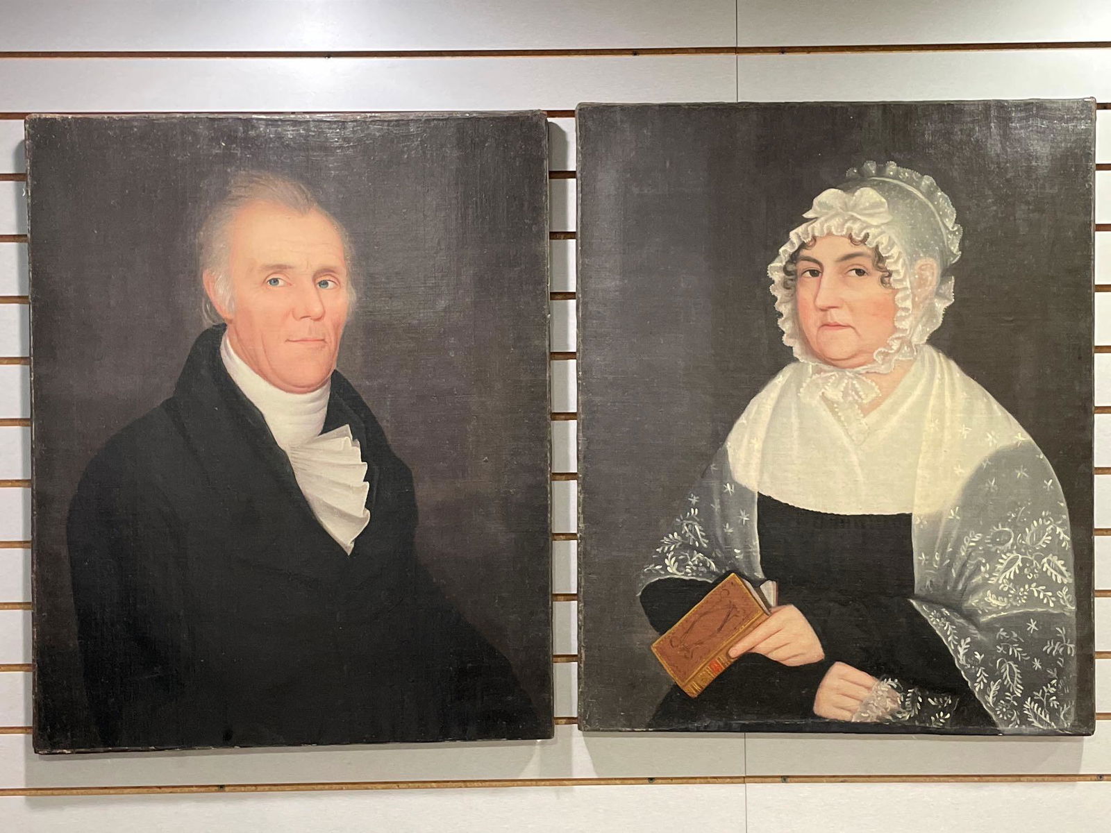 Pair of Ammi Phillips Oils/Canvas, Portraits: Ammi Phillips (American, 1788-1865). A pair of oils on canvas, portraits of Frances Ludlum Morris (1766-1852) and her husband, Robert Morris (1762-1851). They were likely painted in 1820-1821 in Clave