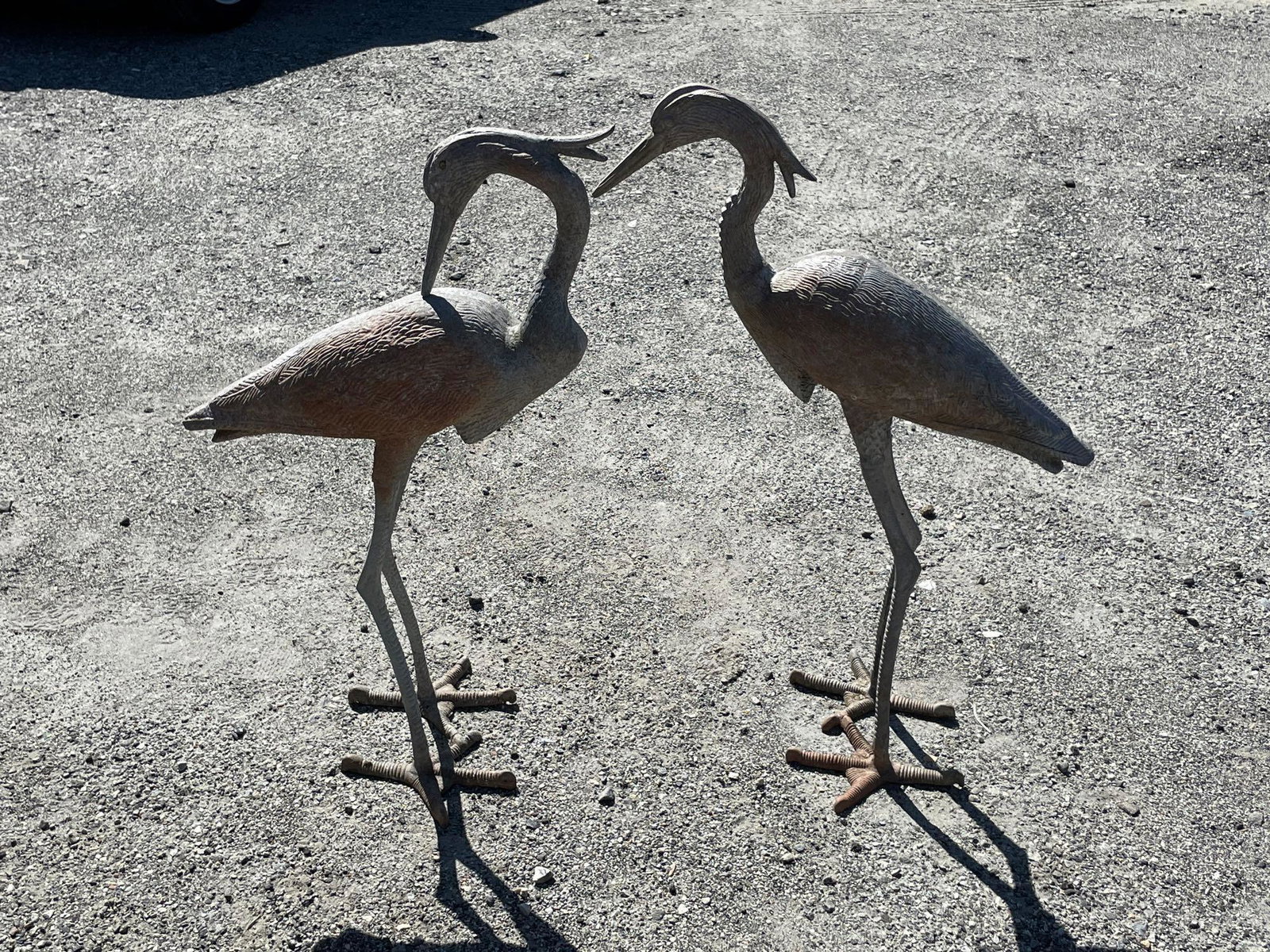 Pair of Cast Metal Garden Crane Sculptures: A pair of cast metal garden crane sculptures. Each approx. 35 in tall.