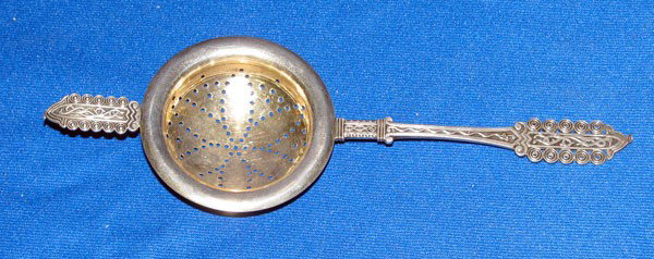 Danish Tea Infuser: Danish 826 silver infuser, dated 1902. Assayed by Simon Groth; maker's mark of J.G. (unidentified). Middle Eastern design. 7-1/4" long). 1.15 ozt.