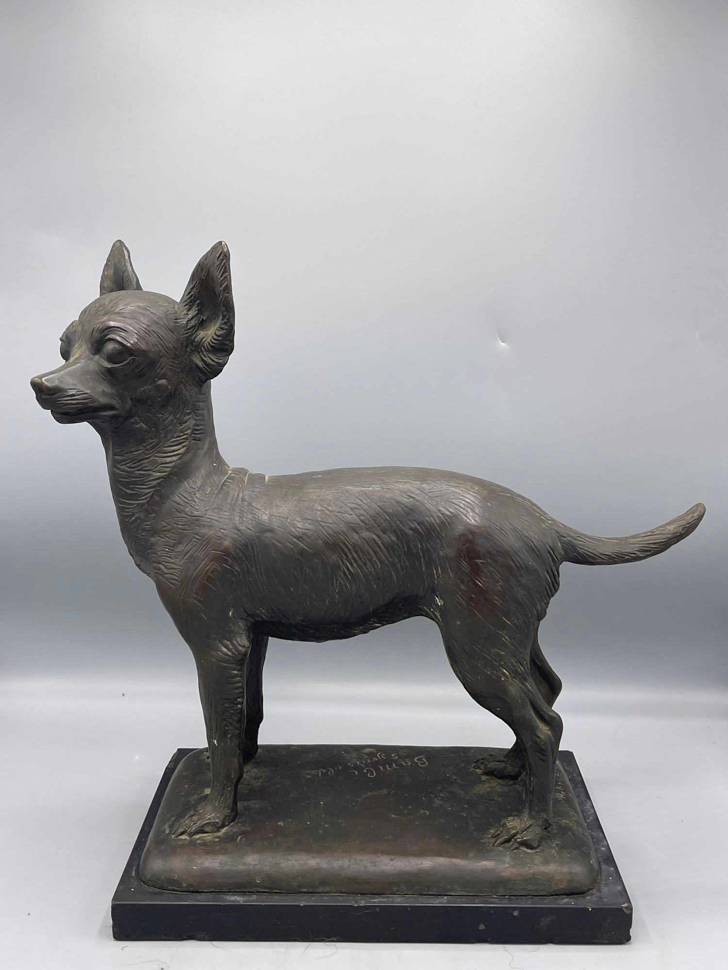 Helene Zelezny. Bronze Dog: Helene Zelezny-Scholz (Czech, 1882-1974). A bronze sculpture of a dog named "Bambi", standing on a black marble base. Inscribed on base, signed and dated "Helene Zelezny 1946" on back. 14in tall x 13i