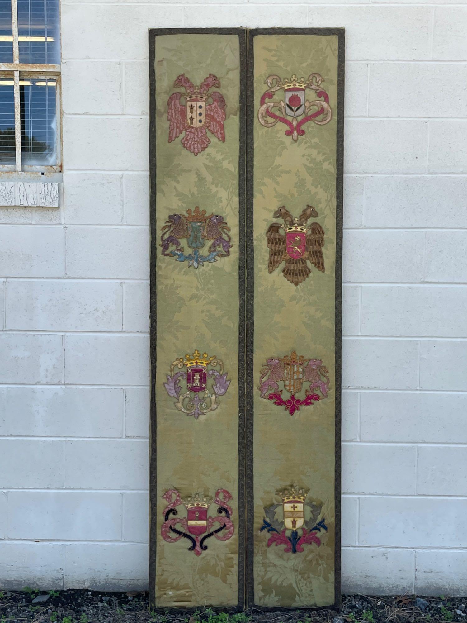Pair of Eagle Embroidered Heraldic Panels: A pair of rectangular heraldic wall hangings with eagle embroidery. Each: 85in tall x 14in wide.