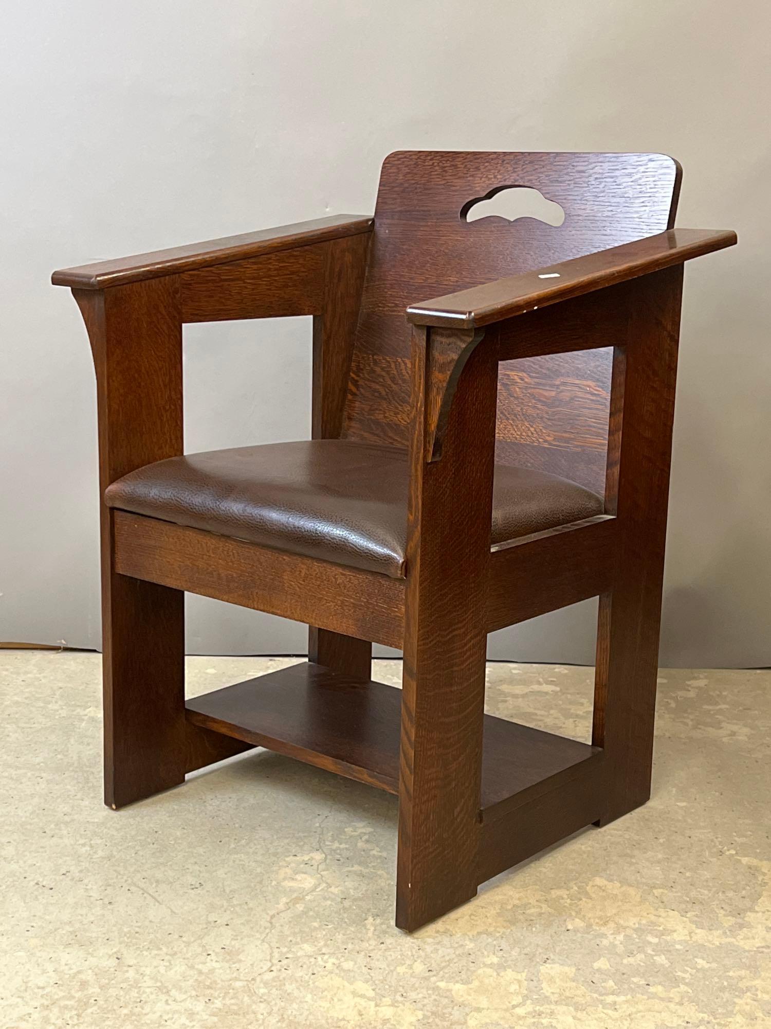 Stickley Oak Cafe Chair: A contemporary Stickley Arts & Crafts style oak cafe chair with leather seat. Metal tag and branded mark. 34 in tall x 26 in wide x 22 in deep.