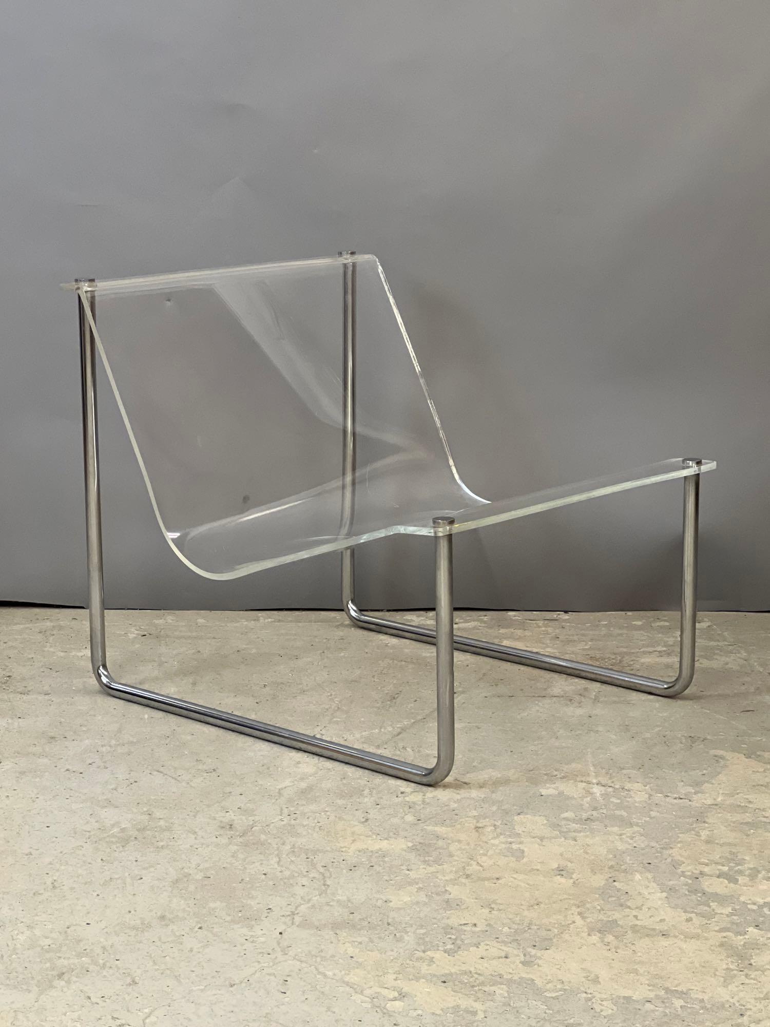 Charles Hollis Jones Lucite Sling Chair: A Charles Hollis Jones modern design lucite sling chair with chrome tubular frame. 24 in tall x 25 in wide x 28 in deep. Slight wobble.