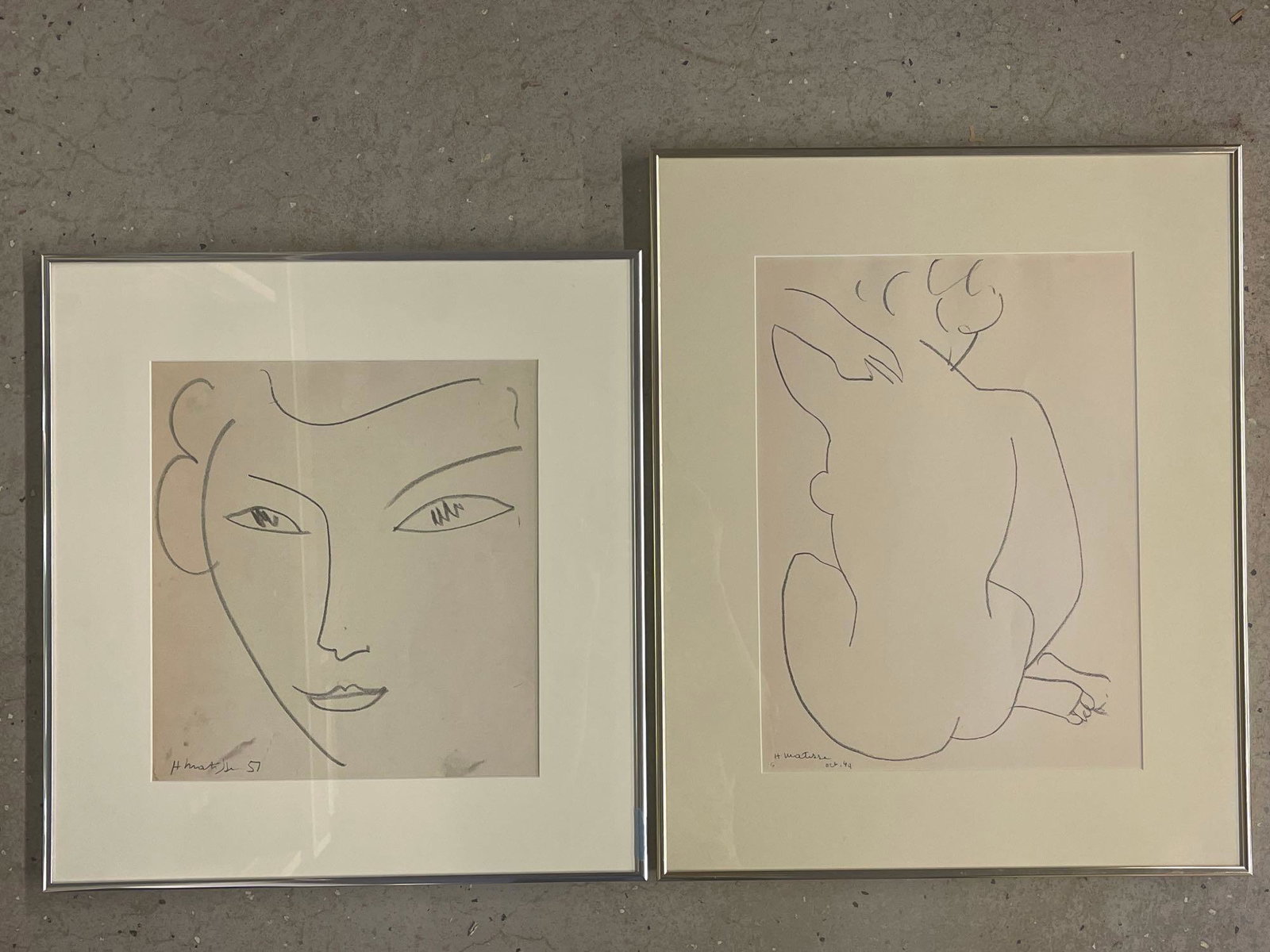 Two Matisse Lithographs: Henri Matisse (French, 1869-1854). A grouping of two lithographs to include a woman's face, attributed bottom left "H Matisse 57", and a larger of a female nude, attributed lower left "H Matisse Oct. 