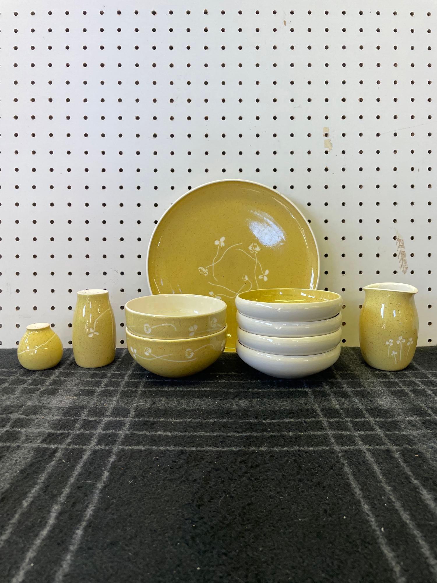 Russel Wright Harkerware Set: (S) A 10 piece set of Russel Wright Harkerware china including 1 salt and 1 pepper shaker, 1 rare creamer pitcher (doubles as flower vase), 4 fruit bowls, 2 deep soup bowls, and 1 dinner plate. Pepper