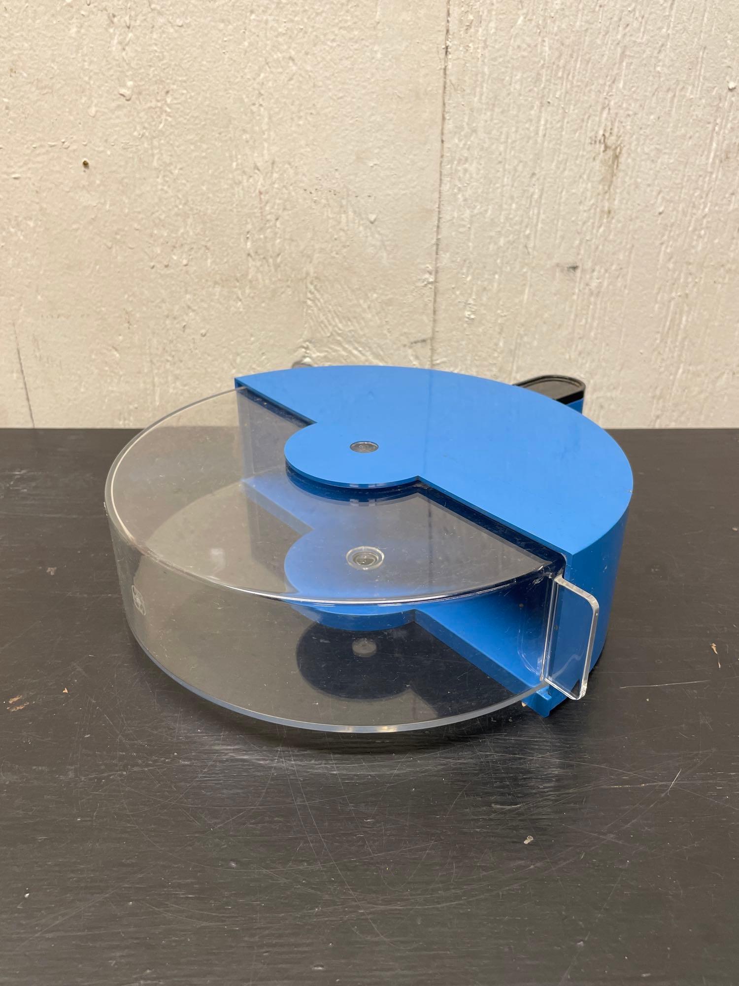 Guzzini Space Age Storage Cylinder: (B) A vintage Italian space age storage cylinder by Guzzini. Use it to store cookies, plates, or pies! Measures 10-1/2in wide x 12in long x 3-1/4in tall. Global shipping available on all items. For a