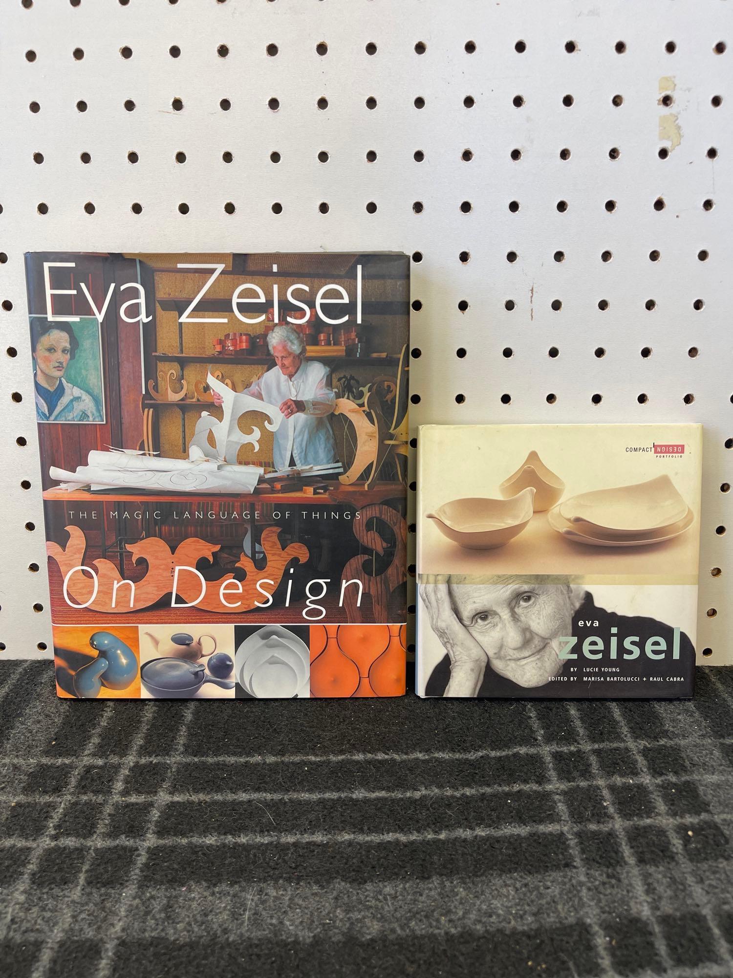 Set of Eva Zeisel Books: (P2) Set of (2) Eva Zeisel books. Larger one is "On Design" by Eva Zeisel (2004) and measures 7.75in deep x 1in wide x 9.5in tall. Smaller one is "Eva Zeisel" by Lucie Young (2003) and measures 6.25in