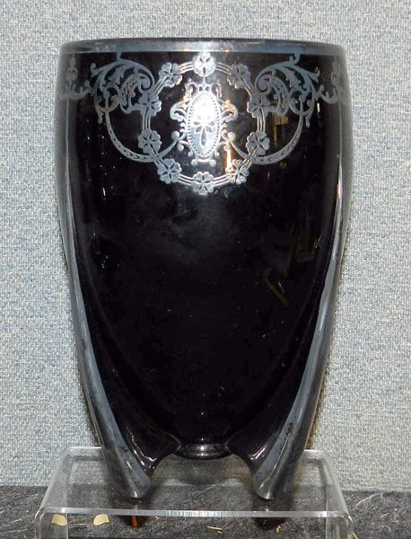 Amethyst Vase with Silver Overlay: Black Amethyst Vase with silver overlay, overlay is marked "sterling", 9" high, 6" diameter