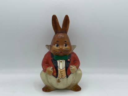 Peter Rabbit Composition Figurine: An early hand-painted Peter Rabbit composition figurine. 9 in tall x 5 in wide.