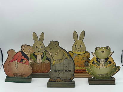 Five Peter Rabbit Quaddy Toys: A grouping of five Peter Rabbit Quaddy Manufacturing of Kansas City cut outs resting on wood bases, to include Peter Rabbit, Mrs. Peter Rabbit, Happy Jack Squirrel, Buster Bear, and Grandfather Frog.