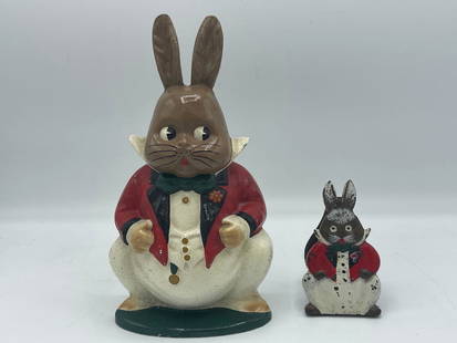 Two Harrison Cady Cast Iron Collectibles: Two Peter Rabbit collectibles to include a large figure hand-painted cast iron door stop and a petite hand-painted cast iron door knocker. 9 in tall x 4-1/2 in wide.