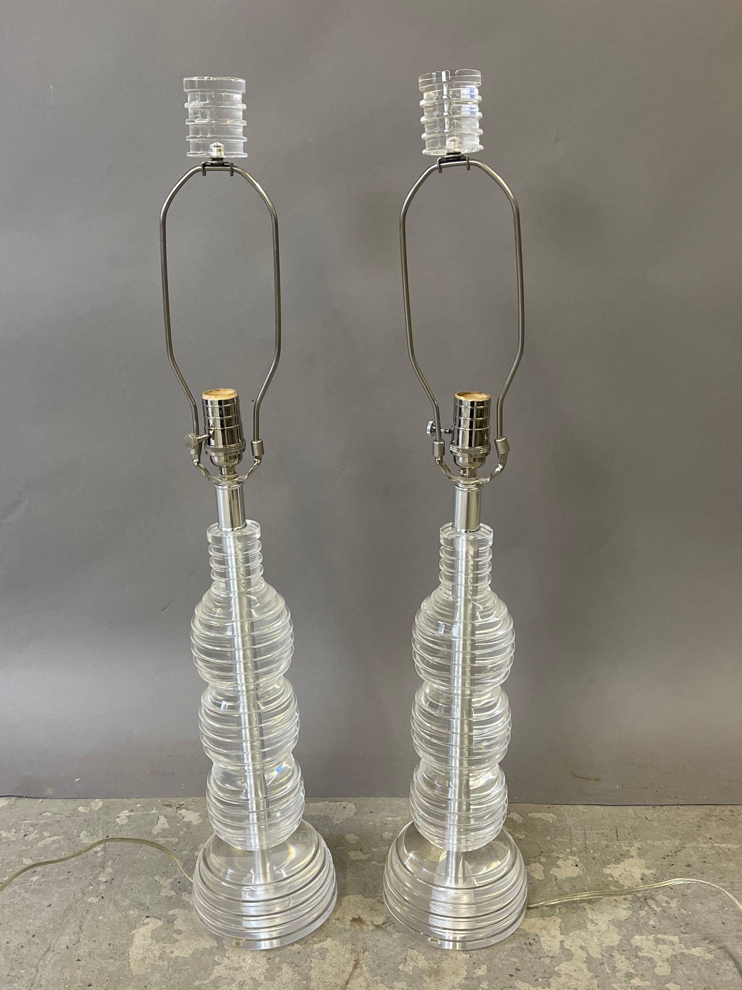 Pair of Van Teal Lucite Table Lamps: A pair of Van Teal lucite bubble-form lamps. Signed Van Teal at base. 32in tall x 6in wide.