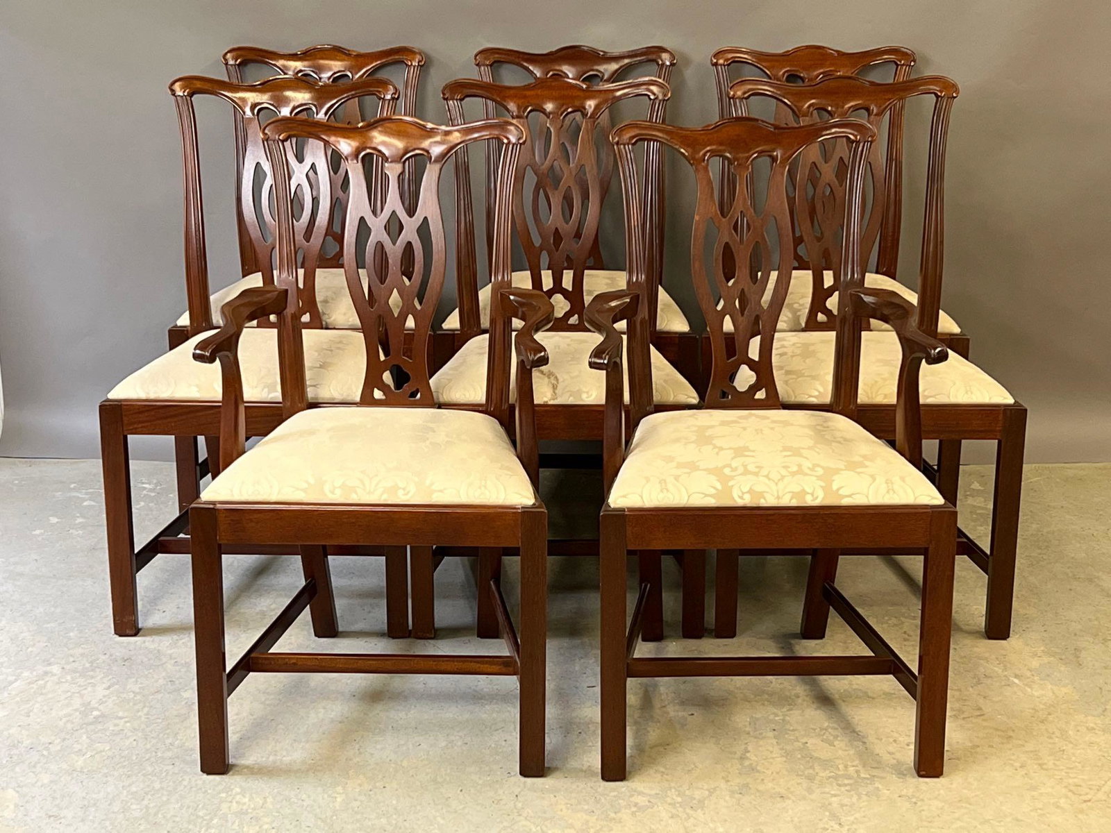 Eight Hickory Chair Dining Chairs: A set of eight Hickory Chair Chippendale-style dining chairs with pierced backs and square legs to include two armchairs and six side chairs. Unmarked. Armchairs: 38in tall x 22-1/4in wide x 18in deep