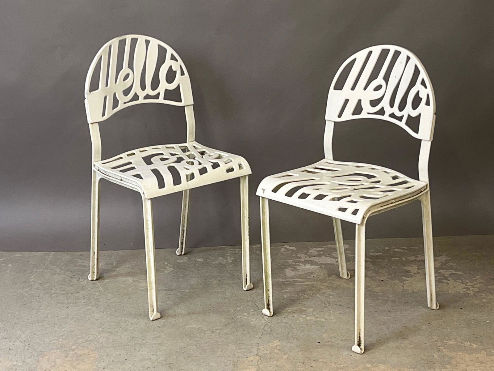 Pair of Artifort Hello There Chairs: A pair of Jeremy Harvey for Artifort enameled metal "Hello There" chairs. Marked. 31in tall x 15in wide x 13-1/2in deep. | Local and NYC curbside delivery details and international third-party shipper