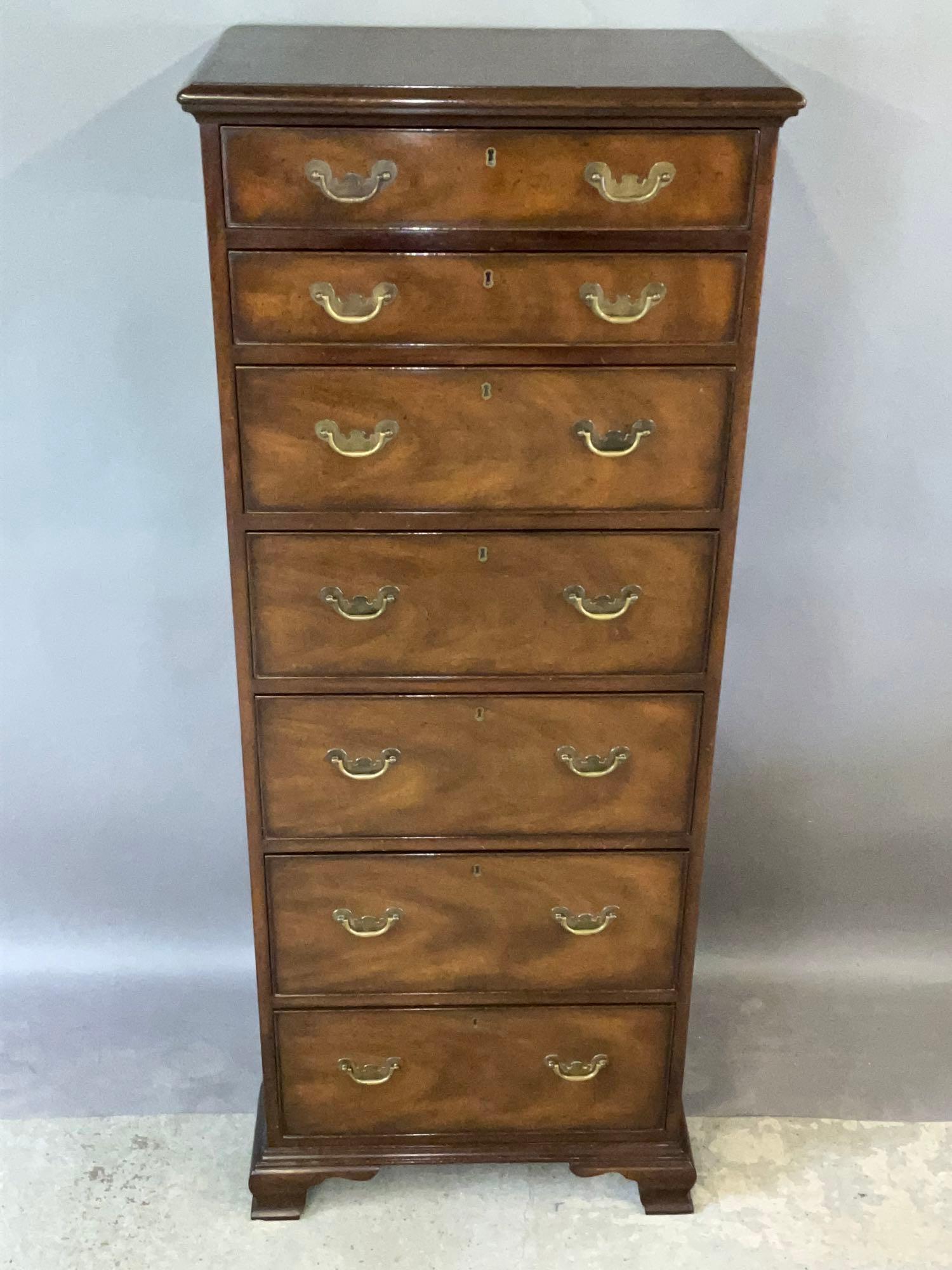 Kittinger Chippendale-style Lingerie Chest: A Kittinger Chippendale-style lingerie chest with seven graduated drawers. 60in tall x 24in wide x 16in deep. | Local and NYC curbside delivery details and international third-party shipper recommenda