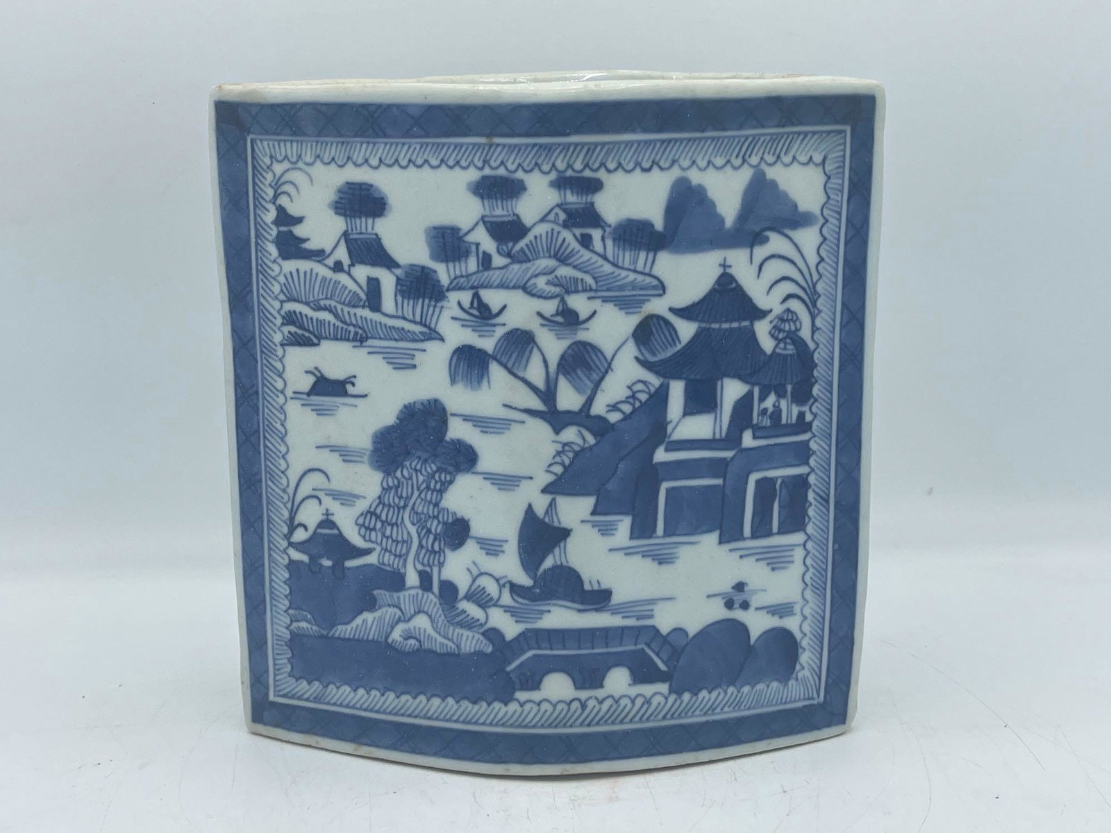 Chinese Canton Blue & White Brush Holder: A Chinese Canton blue and white brush holder. 7-1/2in tall x 7in wide. | Local and NYC curbside delivery details and international third-party shipper recommendations are available on BriggsAuction.co