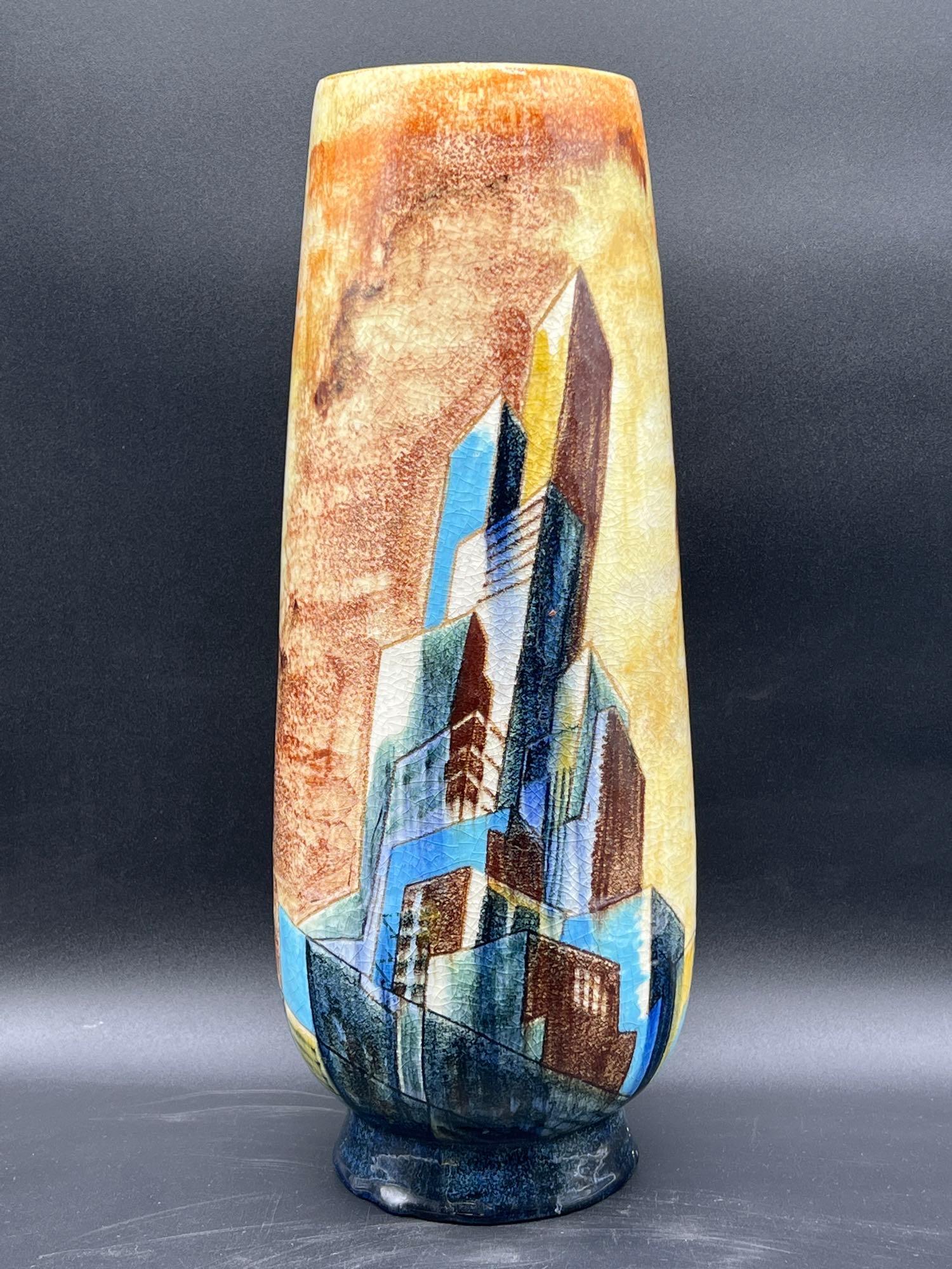 George Schreiber/Stonelain Skyscraper Vase: A George Schreiber for Stonelain glazed and incised earthenware vase with skyscrapers and geometric designs. Signed in glaze and marked on underside. 16-1/2in tall. Provenance: Chestnut Hill Arts & Cr