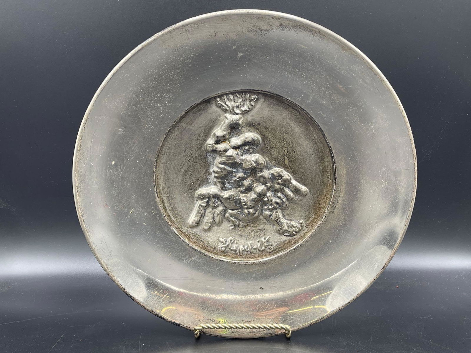 The Struggle Anniversary Silver Salver: A salver depicting "The Struggle" by Jacques Lipchitz, created for the silver anniversary of Israel and issued by Liberty Mint. Certified register #2274, sterling silver mounted on bronze base. 11-1/2