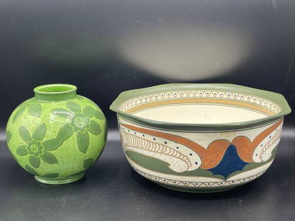 Two Pieces of Arts & Crafts Pottery: To include a Josef Ekberg green glazed vase with floral decoration, signed Gustatsberg 1904 Ekberg on base; and an Arnhemsche Fayence Fabriek bowl with hand-painted decoration, marked Arnhemsche Holla