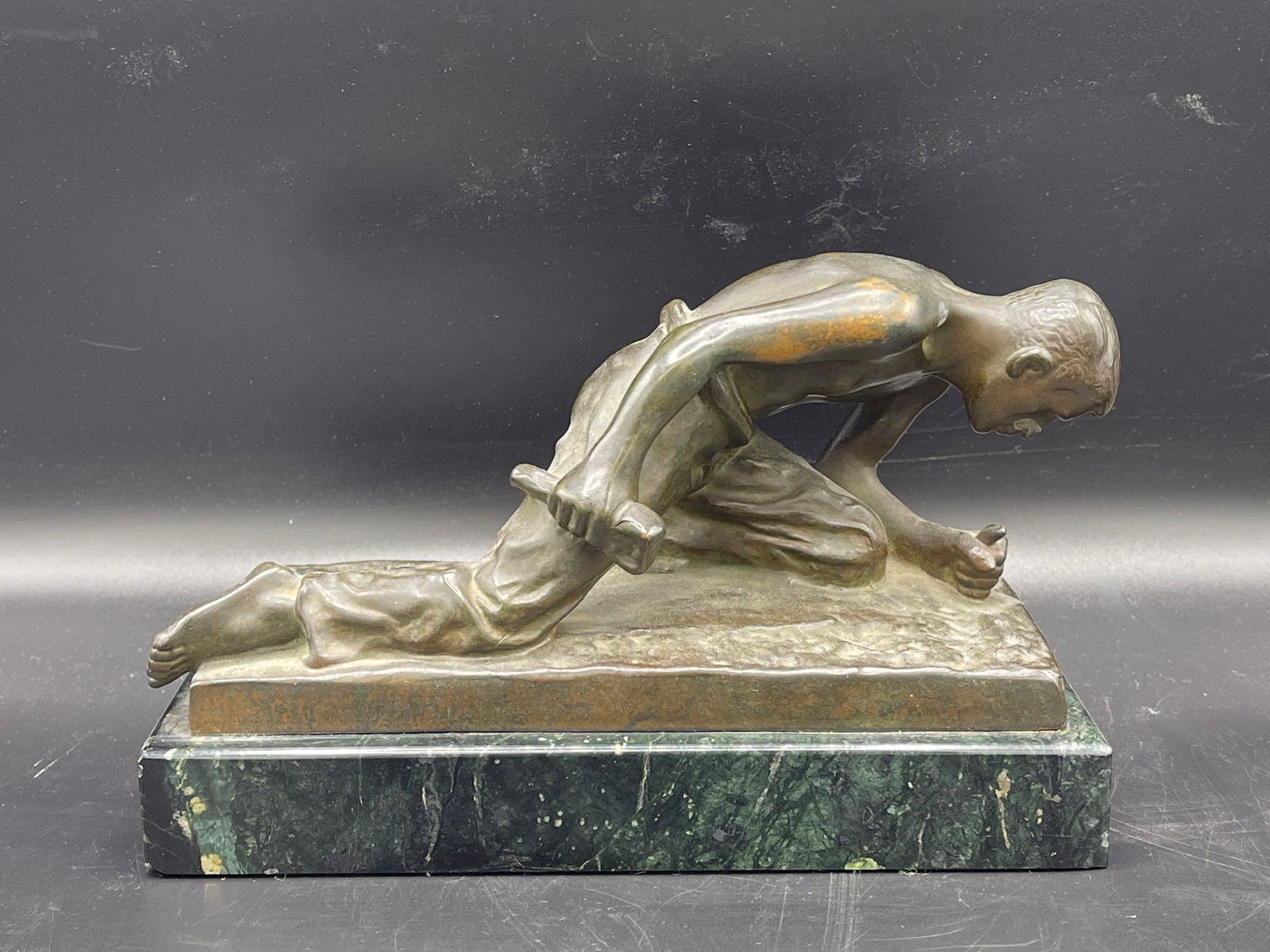 Bronze Sculpture of Man with Mallet (1 of 4)