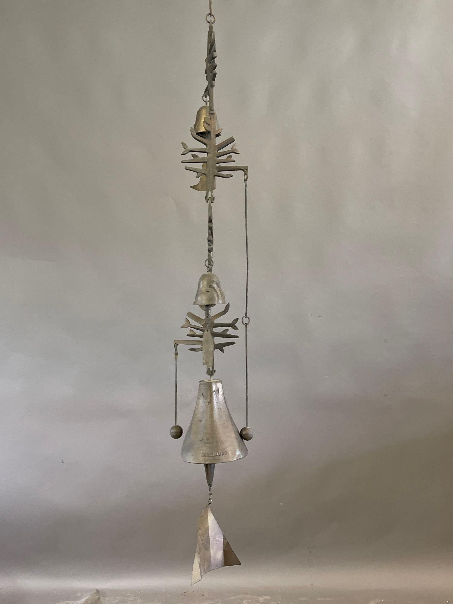 Bronze Wind Bell After Paolo Soleri: An after Paolo Soleri bronze wind bell with fish bone detail and multiple bells. 42in long. | Local and NYC curbside delivery details and international third-party shipper recommendations are availabl
