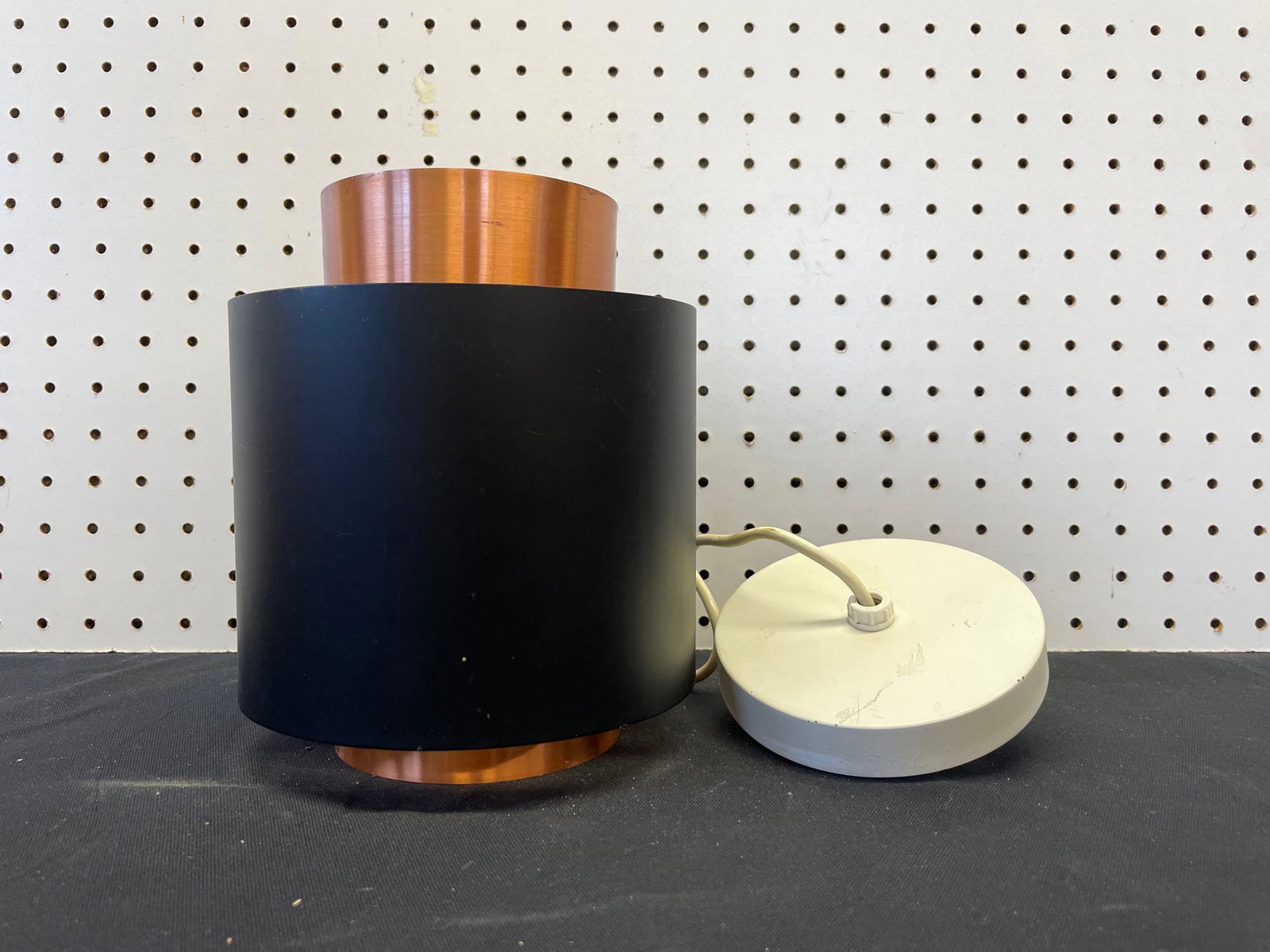 1960s Fog & M ø rup Saturno Danish Hanging Lamp: (S) A vintage Fog & M ø rup midcentury hanging lamp designed by Jo Hammerborg and made in Denmark. Copper interior and black finish on exterior. Switch on cord. Prepped for hardwiring. Ceiling