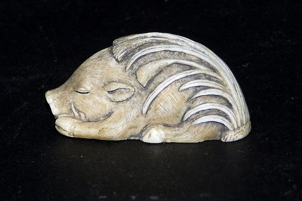 Antique Ivory Netsuke: Sleeping Boar: Antique carved ivory netsuke: sleeping boar. Signed "Palm". 1-3/4" long; 1" high; 3/4" wide.