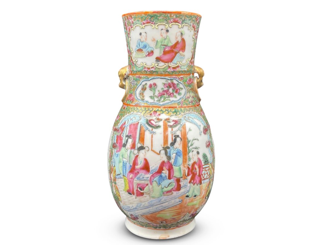 Chinese Famille Rose Urn Vase: A Chinese famille rose urn vase with foo dog form handles and gilt detail. 16in tall x 8in wide. | Philadelphia Metro area and NYC curbside delivery details, and international third-party shipper reco