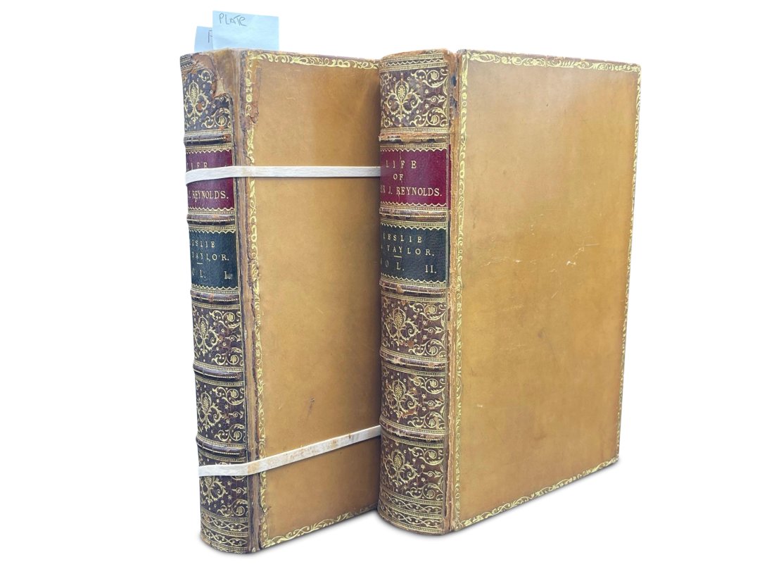 Two Volumes: Life and Times Sir Joshua Reynolds: Two volumes of "Life and Times of Sir Joshua Reynolds" by Charles Robert Leslie. First edition, with 11 full plates. Published by John Murray, London, 1865. Full tan calf covers. 9in tall x 6in wide.