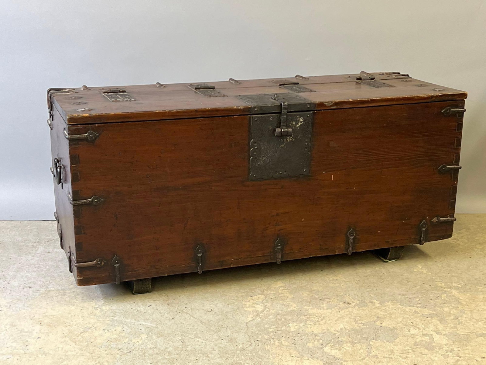 Korean Ton-Kwe Coin Chest: A Korean Ton-Kwe coin chest with iron banding and decorative hardware. 20-1/2in tall x 45in wide x 17-3/4in deep. | Philadelphia Metro area delivery, NYC curbside delivery, and international third-par