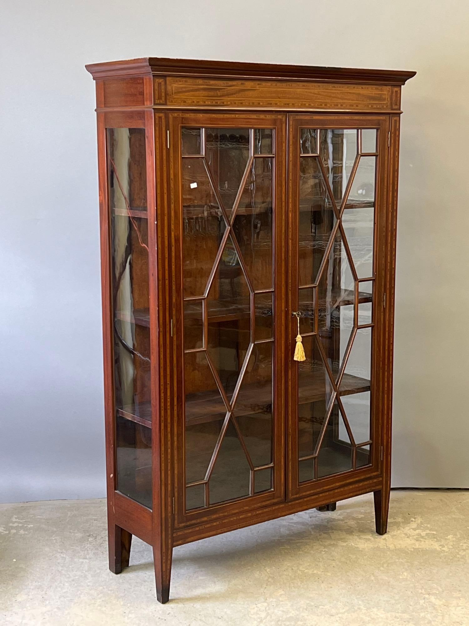 Federal-style Mahogany Bookcase: A Federal-style mahogany two glass door bookcase with satinwood banding, line inlay, and three shelves. 66in tall x 42-1/2in wide x 15in deep. | Philadelphia Metro area delivery, NYC curbside delivery