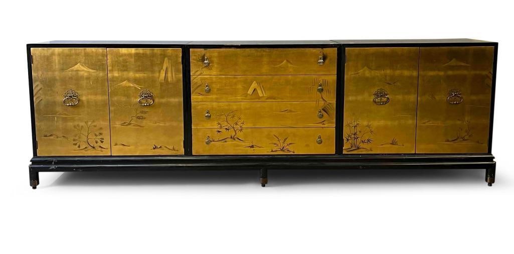 Renzo Rutili Lacquered Credenza: A Renzo Rutili for Johnson Furniture chinoiserie gilt and black lacquered credenza in three parts, on a rectangular frame. The doors are decorated with landscape motifs in an Asian style. 31-1/4in tal