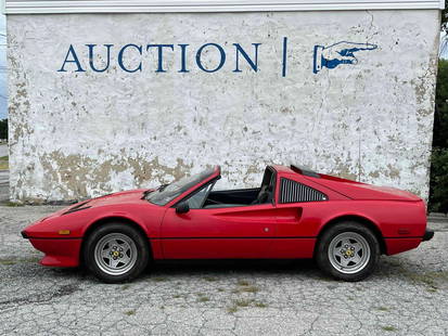 1984 Ferrari 308 GTS Quattrovalvole: VIN: ZFFLA13BOOOO49911. A 1984 Red Ferrari 308 GTS Quattrovalvole finished with a black leather interior. The exterior in red with pop up headlights, removable roof, and louvered rear quarter windows.