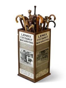 Collection of Canes and Box Stand: A collection of assorted canes in a Lenox Cocoanut Macaroons advertising box stand. Stand: 28in tall x 13-1/2in wide x 13-1/2in deep. | Philadelphia Metro area delivery, NYC curbside delivery, and int