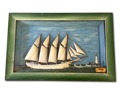 American Folk Art Ship Diorama: An American folk art ship diorama depicting a four master tall ship at sea with a lighthouse in the background. Likely New England. Note on right lower edge states "This model presented to William Ben