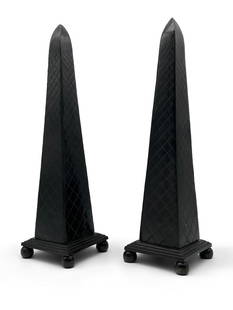 Pair of Neoclassical-style Bronze Obelisks: A pair of contemporary Neoclassical-style bronze obelisks with a dark patina and etched crossed design on stepped square bases and ball feet.17-3/4in tall x 4-3/4in wide. | Philadelphia Metro area del