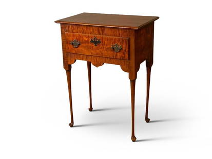 JL Treharn Tiger Maple Dressing Table: A JL Treharn & Co., Youngstown OH, cabinet-made tiger maple dressing table stand with a single drawer, raised on fine Queen Anne legs. Signed under drawer. 34in tall x 25-1/2in wide x 15-1/2in deep. |