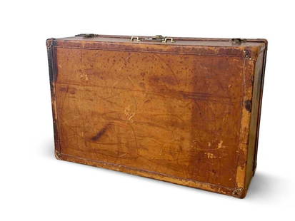 Louis Vuitton Leather Cabin Trunk: An early 20th C. Louis Vuitton leather cabin trunk with monogrammed hardware. Serial number 79136 inside. Marked "Made in France" on hardware clasp with number 076574. Monogrammed. 9-1/2in tall x