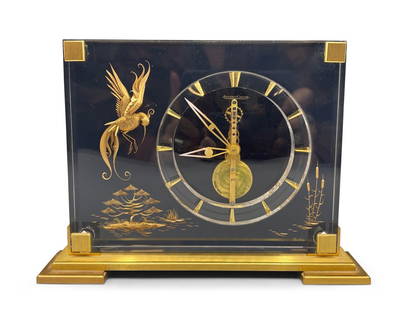 Jaeger Le Coultre Marina Desk Clock: A Jaeger Le Coultre Marina chinoiserie desk clock on brass base. 6-1/2in tall x 9in wide. | Philadelphia Metro area delivery, NYC curbside delivery, and international third-party shipper information a