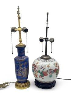 Two Chinese Porcelain Vase Lamps: Two Chinese porcelain lamps to include a famille rose ginger jar with court children decoration, resting on hardwood base; and a blue powder vase with gilt decoration on a brass base. Larger: 23-1/2in