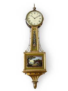 Federal Eglomise Banjo Clock: An eglomise Federal banjo clock with a gilt decorated and mahogany case with reverse painted glass panels, and a later painted dial signed Simon Willard. 41in tall x 11in wide. | Philadelphia Metro ar