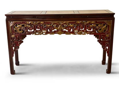 Chinese Carved Altar Table Console: A Chinese carved altar table console with a triple burlwood inset top and fretwork carved frame with red and gilt painted accents. 37-3/4in tall x 63in wide x 19-1/2in deep. | Philadelphia Metro area