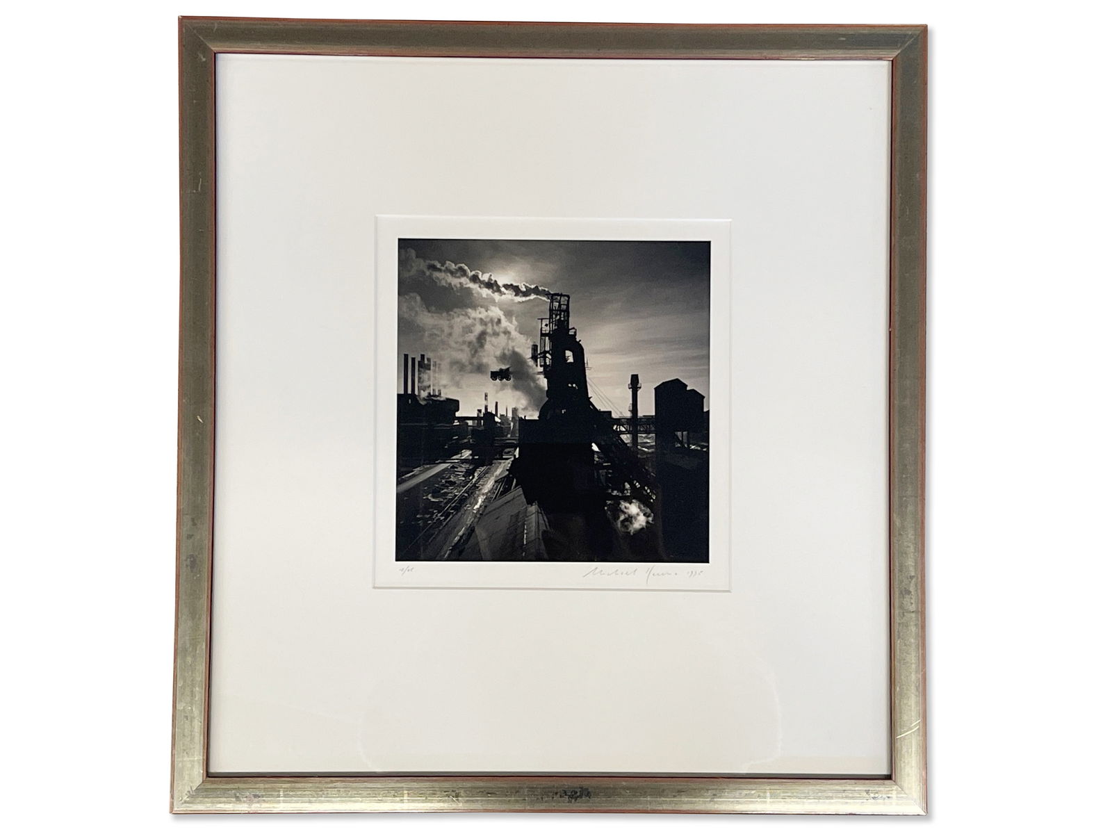 Michael Kenna. Black & White Photograph, Factory: Michael Kenna (American/British, b. 1953). A silver gelatin black and white print of a factory scene. Signed lower right and dated 1995. Numbered 15/45 on left. Photograph: 7-1/2in x 7-1/2in. Frame: 1