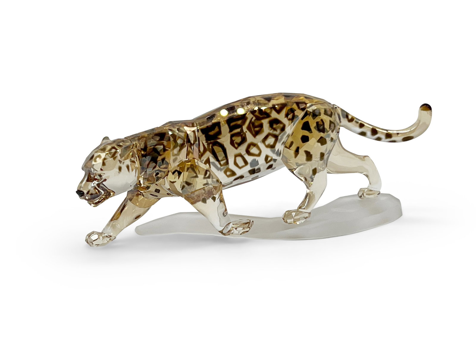 Swarovski Crystal Golden Jaguar Figure: A Swarovski crystal golden jaguar. 2in tall x 6-1/2in wide. | Philadelphia Metro area delivery, NYC curbside delivery, and international third-party shipper information are all available on our websit