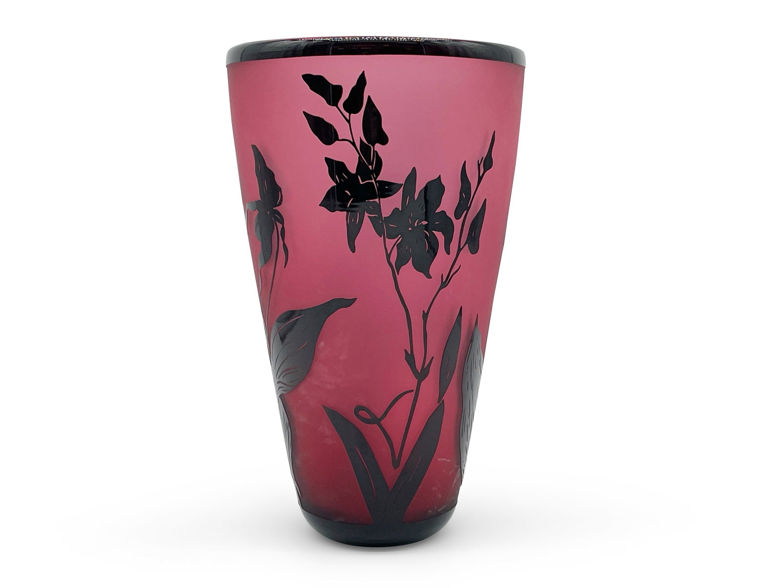 Correia Ruby and Black Orchid Glass Vase: A Correia ruby and black orchid art glass vase with floral relief on ruby hued glass. Signed and dated on base. 12in tall x 7-1/2in wide. | Philadelphia Metro area delivery, NYC curbside delivery, and