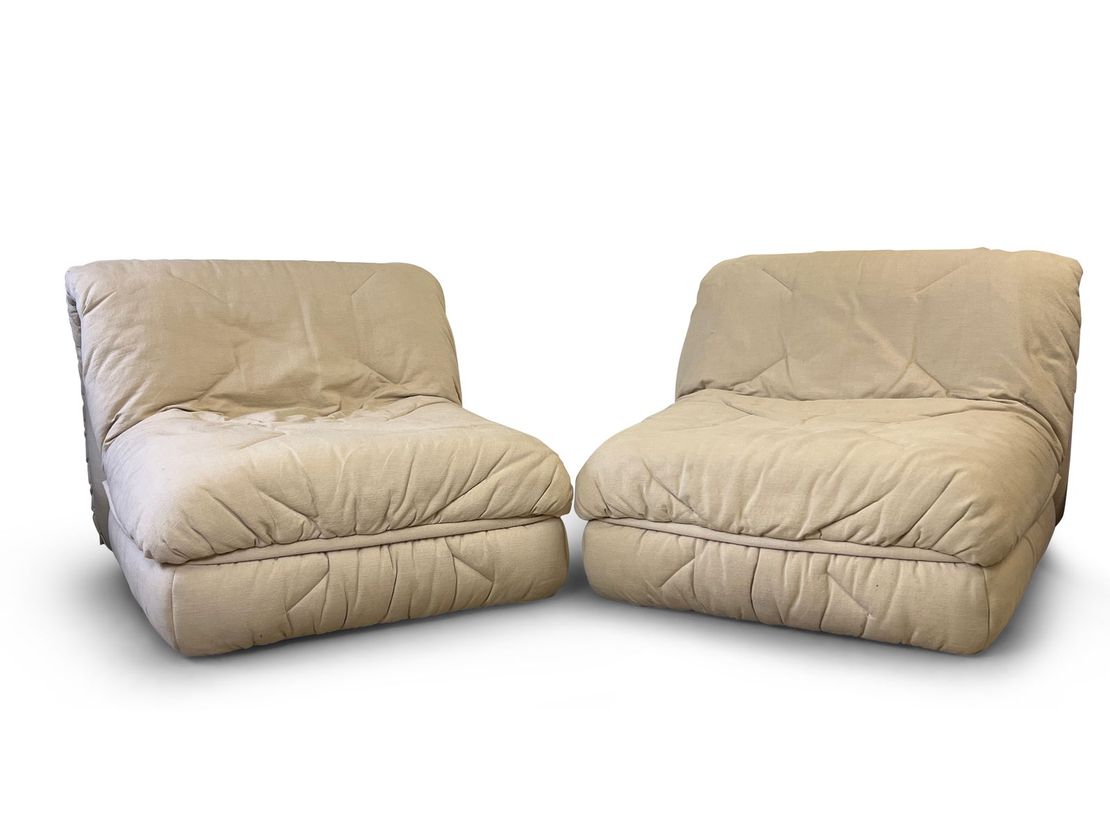 Pair of Roche Bobois Convertible Lounge Chairs: A pair of Roche Bobois upholstered lounge chairs that convert to daybeds. Each: 30in tall x 39in wide x 43in deep. | Philadelphia Metro area delivery, NYC curbside delivery, and international third-pa