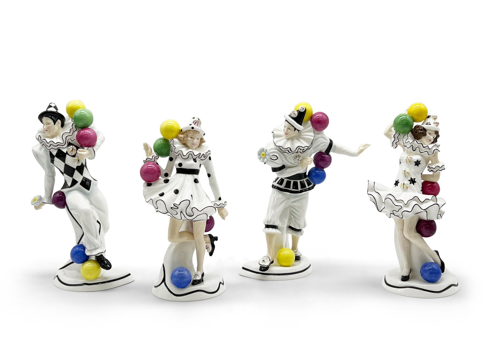 Four Royal Doulton Balloon Clowns: Four Royal Doulton limited edition Balloon Clowns, circa 2008. Jongleur, Franceschina, Trickster, and Harleqina. Two are hand signed "Michael Doulton". Tallest: 9in. | Philadelphia Metro area delivery